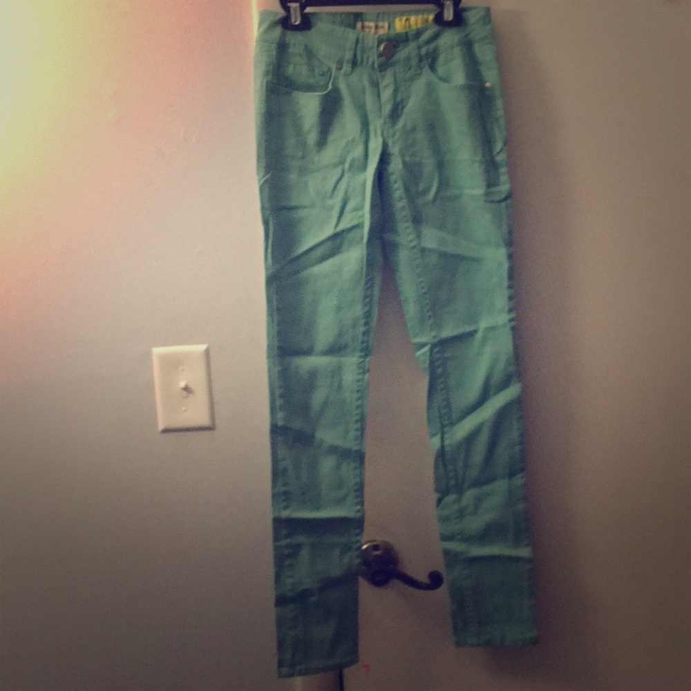 Teal jeans.
